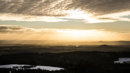 The ruins of Kumburk Castle offer a breathtaking view of the Czech landscape, blanketed in snow.