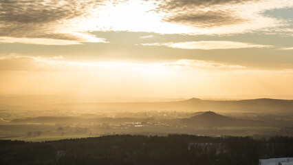 The ruins of Kumburk Castle offer a breathtaking view of the Czech landscape, blanketed in snow.