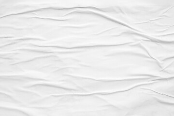 white crumpled and creased glued wrinkled paper poster texture background