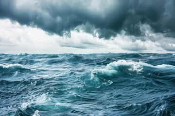 Dramatic ocean waves under foreboding clouds create a striking seascape, capturing the essence of untamed nature and stormy weather.