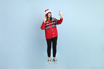 Woman wearing Santa hat