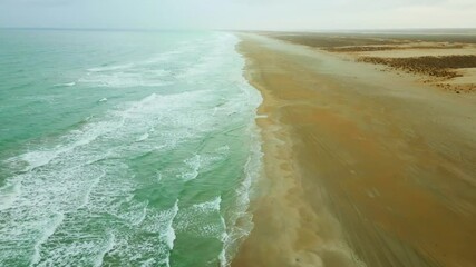 beautiful drone flight over the caspian sea near the city of aktau in autumn on a cloudy day
