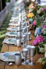 Romantic Outdoor Banquet with Floral Canopy and Chandeliers
