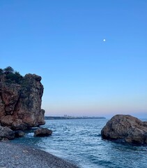 Fototapeta premium Rocks on the blue sea coast