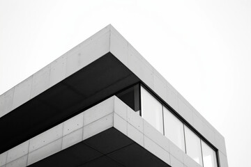 Minimalist modern building under construction, large windows and straight lines, with nothing in the background.