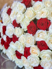 bright bouquet of red and white roses