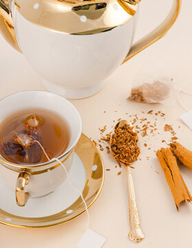 Ceylon cinnamon tea cup and box mockup. Organic cinnamon. Sri Lankan. White tea tag area for your logo.