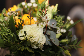 A beautiful bouquet of white and yellow freesia flowers, artfully arranged to capture the freshness and elegance of spring blooms. The gentle hues of white and vibrant yellow combine to create a charm