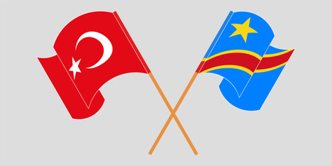 Crossed and waving flags of Turkiye and Democratic Republic of the Congo. Vector illustration
