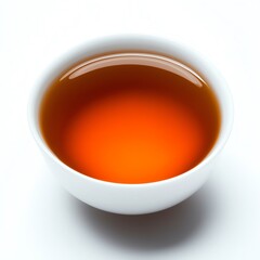 A close-up view of a warm cup of tea, showcasing its rich amber color and inviting appearance on a clean white background.