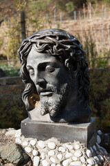 statue of the face of Christ