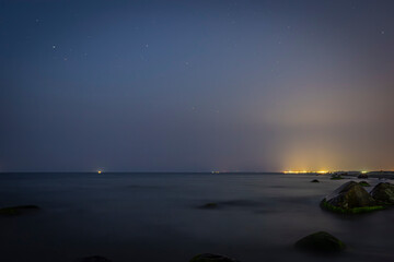 stones on the shore of the Baltic Sea after sunset