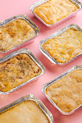 Various chicken pies on pink background © André Polvani