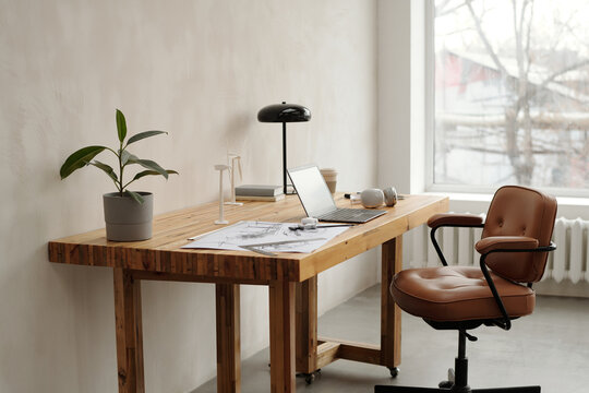 Modern Workspace with Wooden Desk and Office Chair