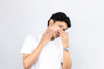 Young Teenager Model Male with Acne Beauty Product Skin Care Isolated With Moisturizer Cream Gesture