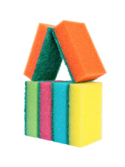 Colorful sponges stacked in the shape of a house on a white background.