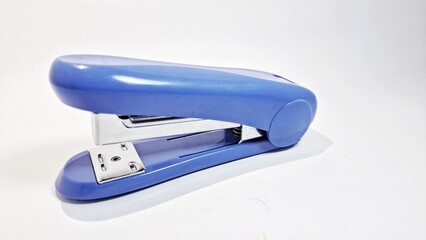 Blue stapler isolated white background. Details of stapler is clear and white basic.