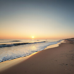 Obraz premium the beach and a calm vast sea the sun shines from the horizon