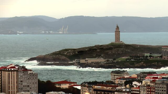Tower of Hercules, lighthouse located in the Spanish city of A Coru&ntilde;a on a day with typical Galician weather with fog and rain