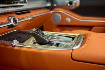 Indulge in Luxurious Orange Leather Car Seats that feature a Unique and Stylish Design