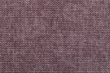 Fototapeta premium Red texture of factory fabric for sewing clothes, furniture