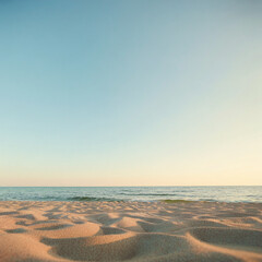 Obraz premium Sandy beach with calm water vast ocean with clear blue sky horizon serene landscape copy space for text