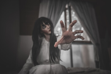 Portrait of asian woman make up ghost,Scary horror scene for background,Halloween festival...