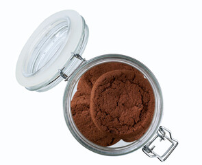 Chocolate cookies in a clear glass bowl isolated on white background, top view.