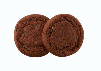Two chocolate cookies isolated. Round chocolate cookies isolated on white background, top view.