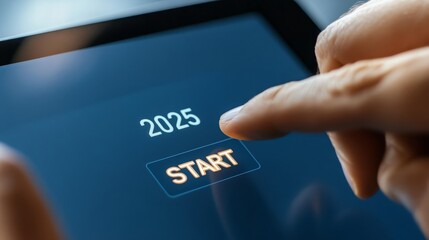 A finger hovers over a 'Start' button on a digital screen displaying the year 2025. This image represents the anticipation and readiness for the new year.