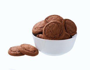 Chocolate cookies in a ceramic bowl isolated on white background.