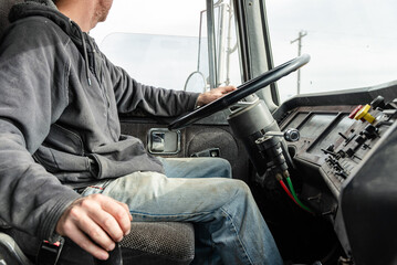 Interior View of an Old Semi Truck Dashboard: Dusty Controls for Air Brakes, Cruise Control, with Keys in the Ignition, as Farmer Shifts Gears on a Rural Dirt Road with Crops Out window