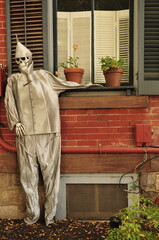Man of tin by window for Halloween