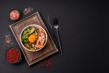 Grilled salmon with salt and spices, broccoli, tomatoes, rice