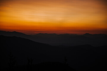 Beautiful sunset in the mountains. Dramatic scene. Carpathian