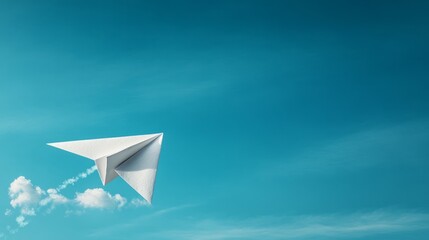 paper airplane on a clear blue sky background 