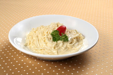 Capellini with four cheese sauce