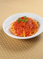 fettuccine with tomato sauce on plate