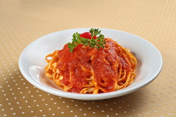 fettuccine with tomato sauce on plate