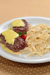 Fettuccine Alfredo with fillet medallion in mustard sauce