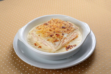 White Lasagna with ham and cheese in white sauce