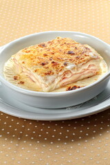 White Lasagna with ham and cheese in white sauce