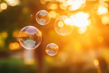 Elegant abstract soap bubbles glimmering in sunset over a romantic outdoor park scene