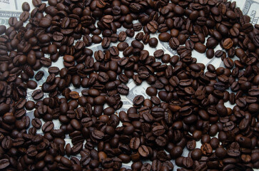 coffee as a business, coffee beans on the background of dollars