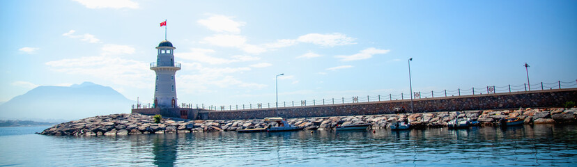 Lighthouse in the Mediterranean Sea in Alanya. Horizontal image.