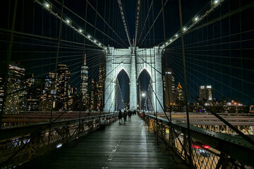 Brooklyn Bridge at night and Manhattan skyline