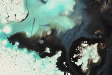 Selbstklebende Fototapeten Farben Im Wasser Black, blue Ink watercolor spray blot on beige paper background.  © Liliia