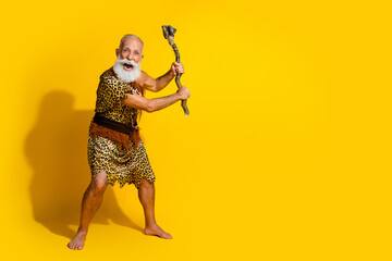 Full body portrait of primeval caveman fight stone axe empty space wear leopard skin clothes...