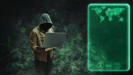 Faceless, anonymous hacker in a hoodie and leather jacket standing with a laptop against a dark background featuring a forex or trading chart. Empty space for text, copy space