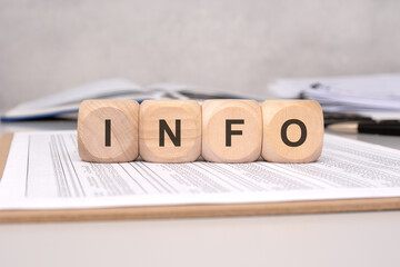 Information Blocks on Top of Desk Surrounded by Papers and Documents for Various Purposes